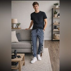 Hollister Men's Navy Joggers with Logo Stripes